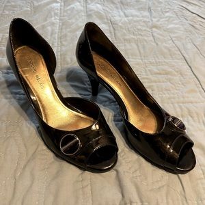 Black patent peekaboo pumps